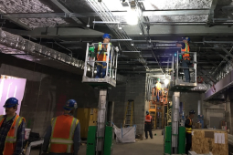 Electrical workers in a tunnel.