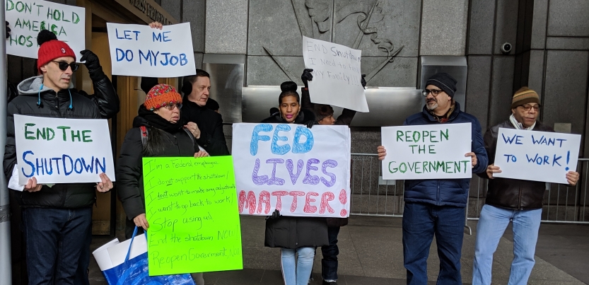 Federal government employees and their supporters rally on January 10, 2019, in front of a federal building in New York to protest the government shutdown.