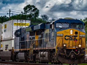 A CSX train with JB Hunt containers heads towards the camera.