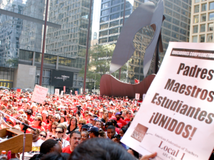 Chicago Teachers Union members rally at a Labor Day gathering. 