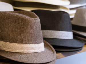 Stacks of hats on display at a store.