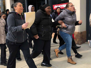 Stamford Sheraton hotel workers march on the boss.