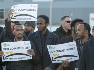 Around 200 Amazon workers, mostly of East African descent, protested outside their workplace in Minnesota.