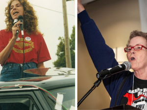 Two images of Anne Feeney. In the one on the left she is younger with long hair, standing on the bed of a pickup truck, singing into a mic, wearing a red "Solidarity Forever" T-shirt. In the one on the right she is older with shorter hair, singing into a mic indoors at the Labor Notes Conference, one fist in the air, wearing a black "Railroad Workers United" T-shirt, with a "Troublemakers Union" banner hanging on the wall behind her.