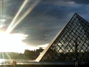 The Louvre's outside pyramid at sunset.