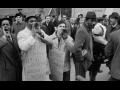 Postal strike 1970, men standing front of a mail truck