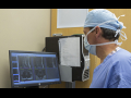 Doctor views imaging machine