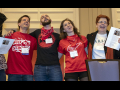Group of singers in line, with arms around each other, at 2018 Labor Notes Conference.