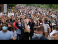 Crowd of protesters protesting George Floyd murder