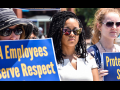 Three EPA workers protesting with signs: EPA workers demand respect. Other sign cut off.