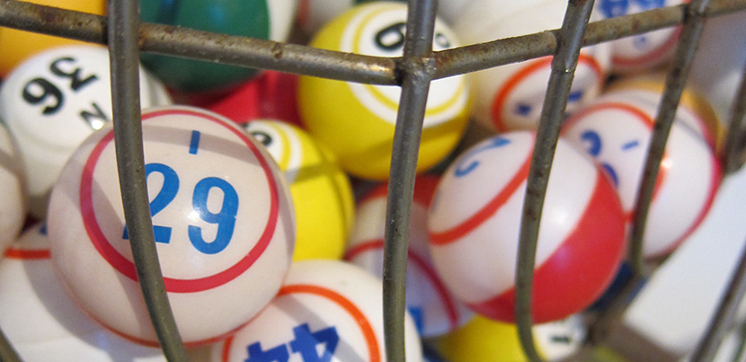 Bingo balls in metal cage