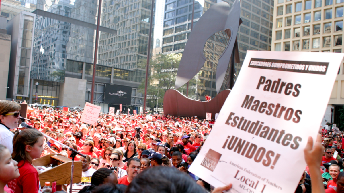 Chicago Teachers Union members rally at a Labor Day gathering. 