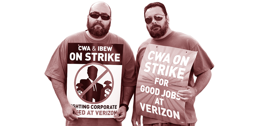 Two workers standing together holding signs.