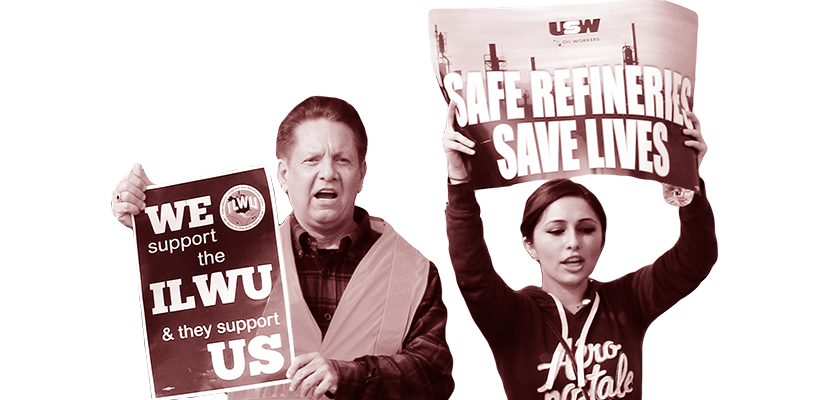 Two workers holding up signs.