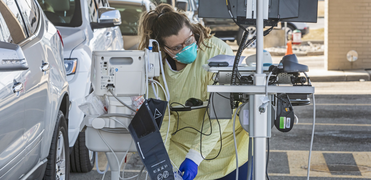 Nurses performing drive-thru tests for COVID-19 at Beaumont Hospital in Royal Oak, Michigan.