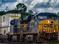 A CSX train with JB Hunt containers heads towards the camera.